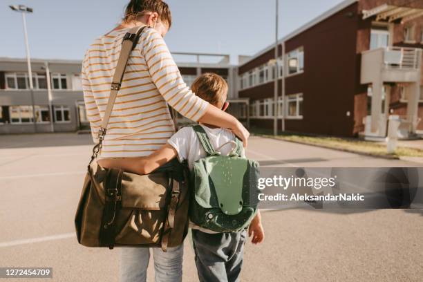 going back home after my first day at school - leaving school imagens e fotografias de stock