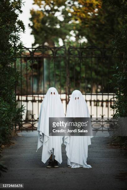 children dressed up as ghost - halloween 2020 stock pictures, royalty-free photos & images