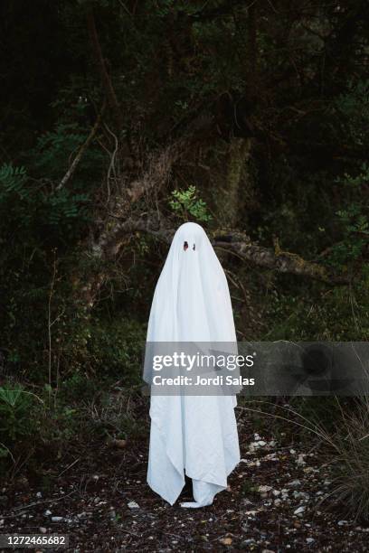 child dressed up as ghost - halloween costume stock pictures, royalty-free photos & images