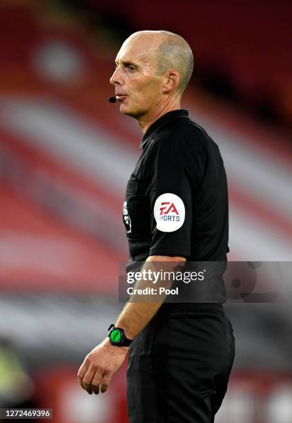 Referee Mike Dean looks on during the Premier League match between Sheffield United and Wolverhampton Wanderers at Bramall Lane on September 14, 2020...