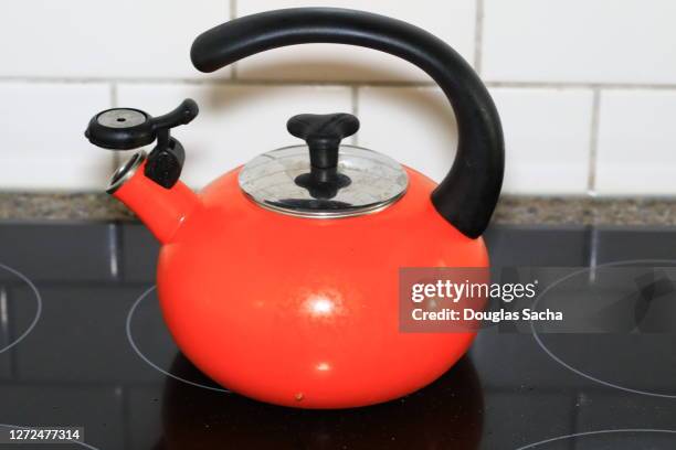 tea kettle on a electric stove top - kettle steam stock pictures, royalty-free photos & images