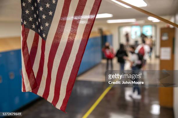 Students walk through the halls between classes at Rippowam Middle School on September 14, 2020 in Stamford, Connecticut. Most students there are...