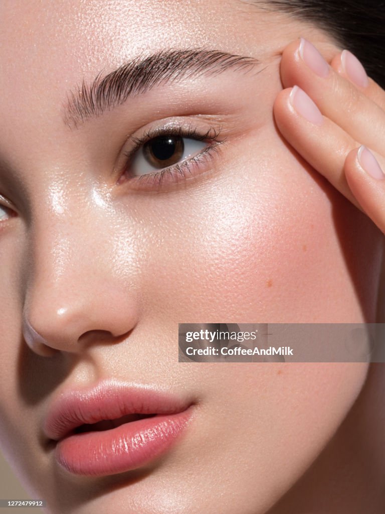 Close-up portrait of young and beautiful woman