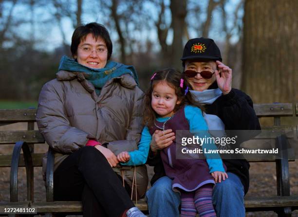 Yoko Ono, widow of John Lennon, is pictured for the first time with her formerly estranged daughter, Kyoko Cox and her granddaughter, Emi , on a park...