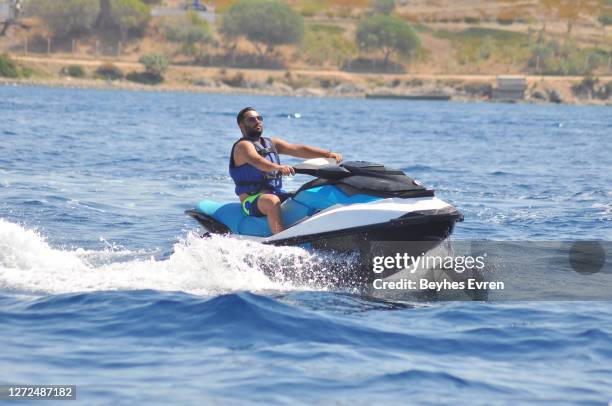 man on jet ski having fun - jet ski stock pictures, royalty-free photos & images