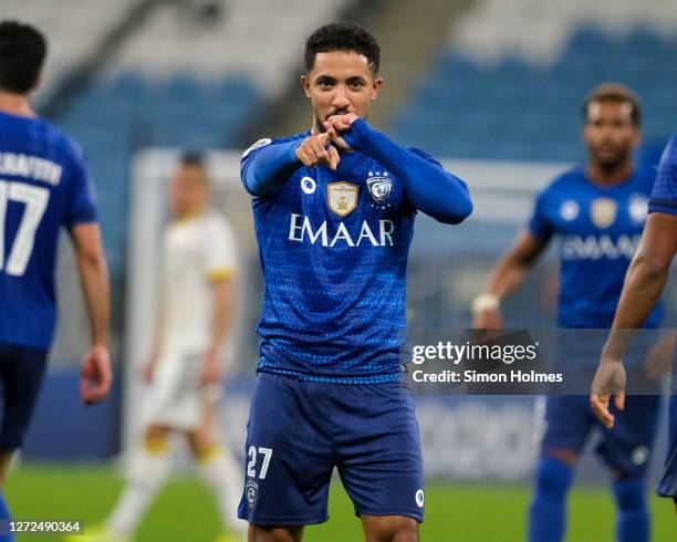 Hattan Bahebri of Al Hilal celebrates his stoppage time winner during the AFC Champions League match between Al Hilal SFC and Pakhtakor at Al Janoub...