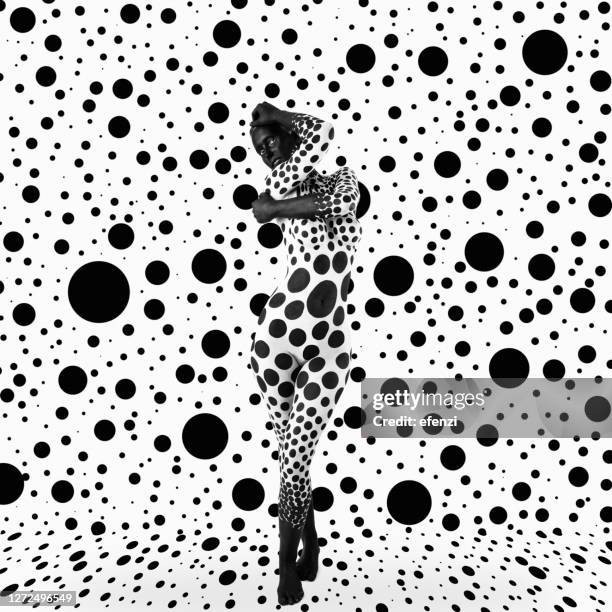 bodypainting - black circles - woman black and white stock pictures, royalty-free photos & images