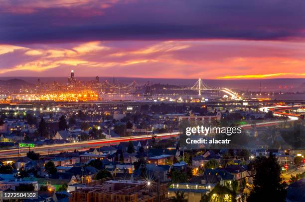 oakland, california, dusk - oakland california night stock pictures, royalty-free photos & images