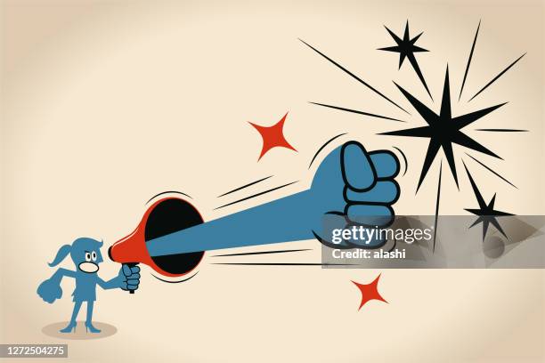 blue business woman is shouting through a megaphone and punching with a fist - angry woman stock illustrations