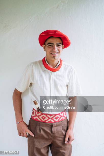 portrait of 18 year old gaucho in traditional clothing - gaucho argentina stock pictures, royalty-free photos & images