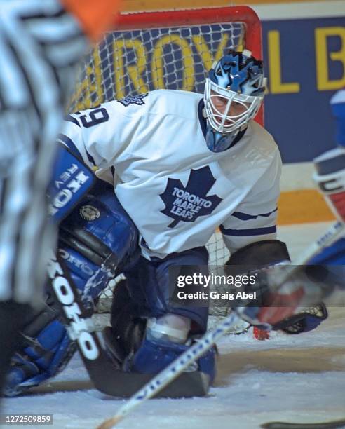 Felix Potvin of the Toronto Maple Leafs skates against the New York Rangers during NHL game action on December 4, 1993 at Maple Leaf Gardens in...