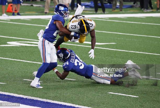 James Washington of the Pittsburgh Steelers catches a pass to score a touchdown against the New York Giants during the second quarter in the game at...