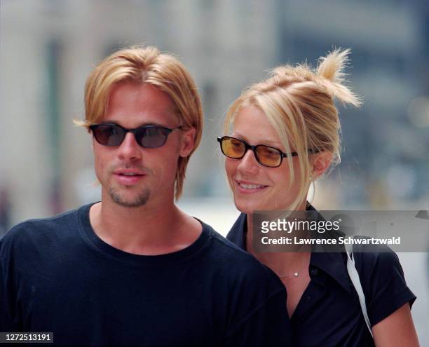 Brad Pitt and Gwyneth Paltrow look beautiful and happy while strolling on Madison Avenue, NYC, on August 3, 1996.