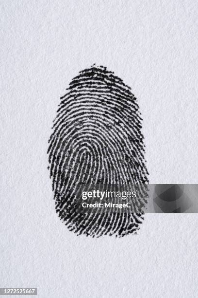 human fingerprint on white paper - printmaking technique stock pictures, royalty-free photos & images