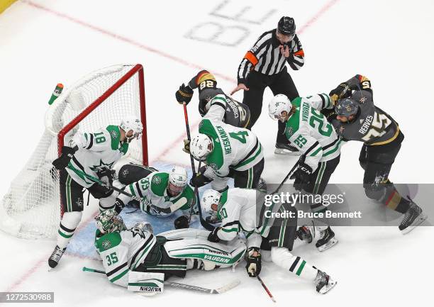 Anton Khudobin of the Dallas Stars covers up the puck against the Vegas Golden Knights during the second period in Game Five of the Western...