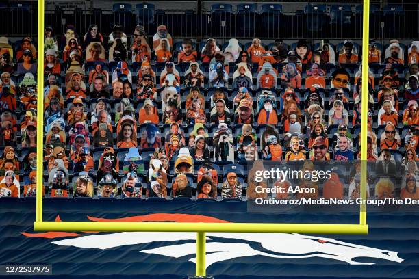 Cardboard fans fill the seats as the Denver Broncos host the Tennessee Titans during the second half of Tennessee's 16-14 win on Monday, September...