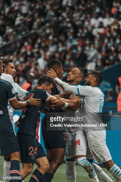 Dimitri Payet, Jordan Amavi, Presnel Kimpembe during the Ligue 1 match between Paris Saint-Germain and Olympique Marseille at Parc des Princes on...