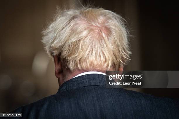 British Prime Minister Boris Johnson walks from Downing Street towards the weekly Cabinet meeting at the Foreign & Commonwealth Office on September...