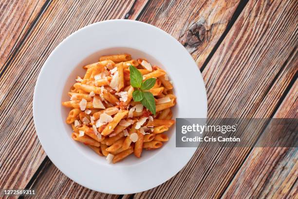 penne with tomato sauce - penne pasta stock pictures, royalty-free photos & images