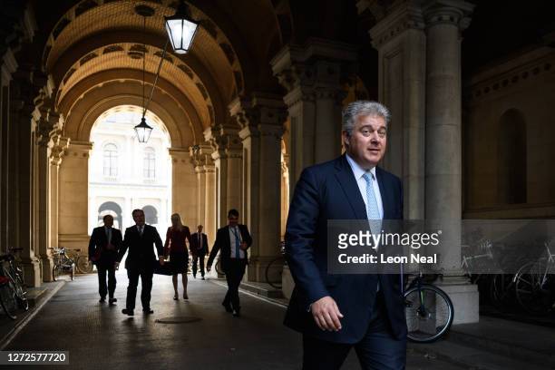 Northern Ireland Secretary Brandon Lewis walks towards Downing Street following the weekly Cabinet meeting at the Foreign & Commonwealth Office on...