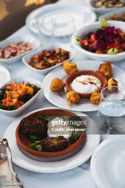 turkish and greek traditional dinning table with special alcohol drink raki - middle eastern food stock pictures, royalty-free photos & images