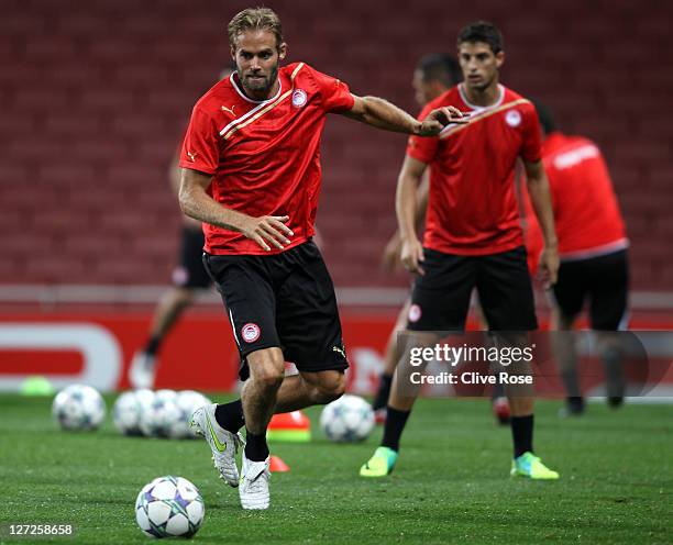 Olof Mellberg of Olympiacos in action during a training session ahead of the UEFA Champions League Group match against Arsenal at the Emirates...