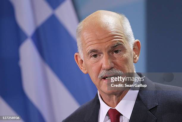Greek Prime Minister George Papandreou speaks to the media prior to talks with German Chancellor Angela Merkel at the Chancellery on September 27,...