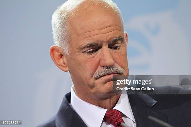 Greek Prime Minister George Papandreou speaks to the media prior to talks with German Chancellor Angela Merkel at the Chancellery on September 27,...