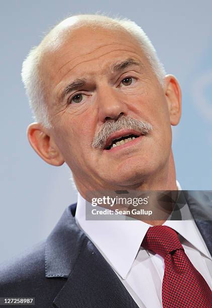 Greek Prime Minister George Papandreou speaks to the media prior to talks with German Chancellor Angela Merkel at the Chancellery on September 27,...