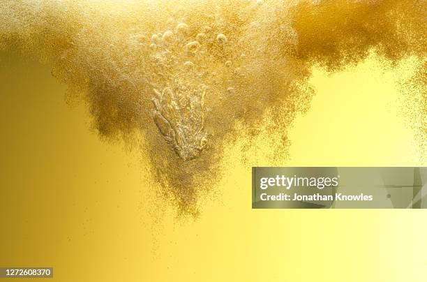 bubbles in golden beer - beer bubbles stock pictures, royalty-free photos & images