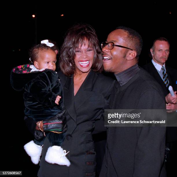 Whitney Houston, daughter Bobbi Kristina, and husband Bobby Brown arrive at Tavern On the Green in NYC for Bobby's 25th Birthday party on February 4,...
