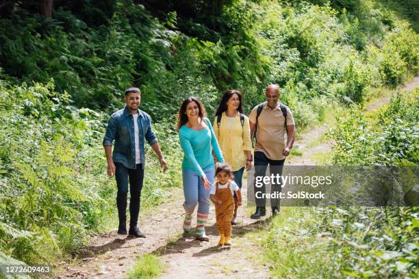 making the most of summer - pakistani people stock pictures, royalty-free photos & images