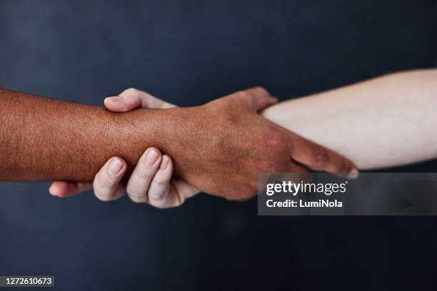 we're stronger when we stick together - racial-equality stock pictures, royalty-free photos & images