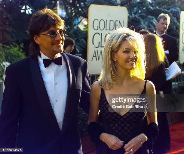 Heather Locklear and Richie Sambora arrive at Golden Globe Awards Show, January 19, 1997 in Beverly Hills, California.