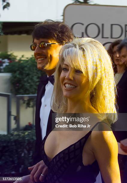 Heather Locklear and Richie Sambora arrive at Golden Globe Awards Show, January 19, 1997 in Beverly Hills, California.