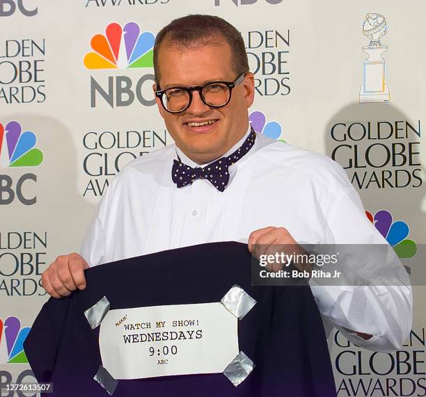 Drew Carey does some self-promotion backstage at Golden Globe Awards Show, January 19, 1997 in Beverly Hills, California.