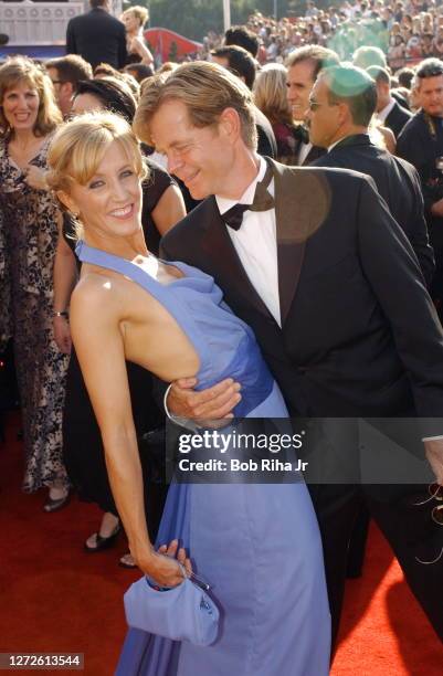 William Macy and Felicity Huffman arrive at Emmy Awards Show, September 21, 2003 in Los Angeles, California.