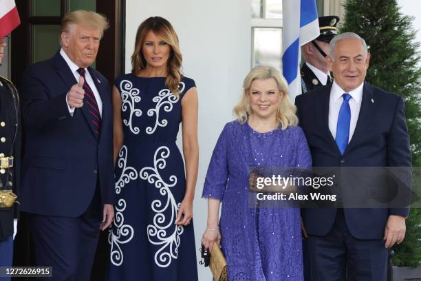 President Donald Trump and First Lady Melania Trump welcome Prime Minister of Israel Benjamin Netanyahu and his wife Sara Netanyahu to the White...