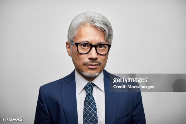 entrepreneur with eyeglasses on white background - capelli grigi foto e immagini stock