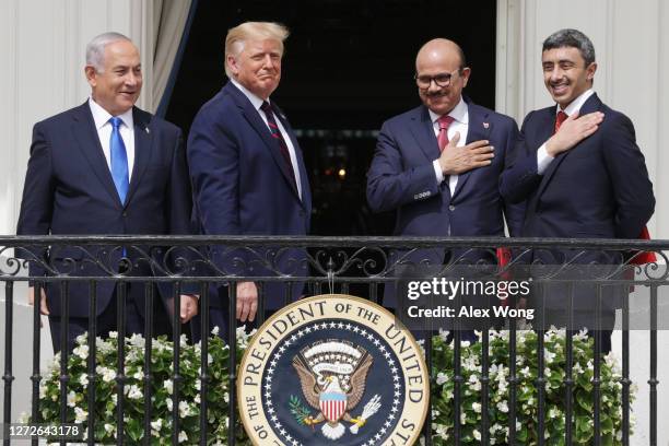 Prime Minister of Israel Benjamin Netanyahu, U.S. President Donald Trump, Foreign Affairs Minister of Bahrain Abdullatif bin Rashid Al Zayani, and...