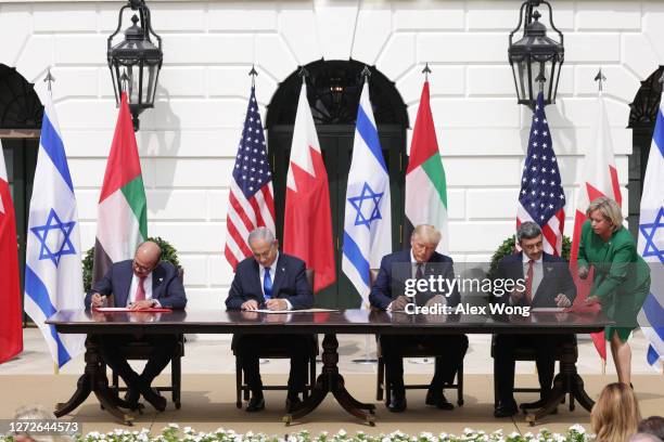 Foreign Affairs Minister of Bahrain Abdullatif bin Rashid Al Zayani, Prime Minister of Israel Benjamin Netanyahu, U.S. President Donald Trump, and...