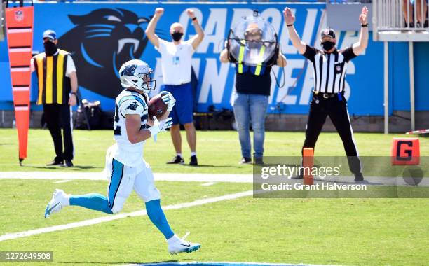 Christian McCaffrey of the Carolina Panthers scores a touchdown against the Las Vegas Raiders during the first quarter of their game at Bank of...
