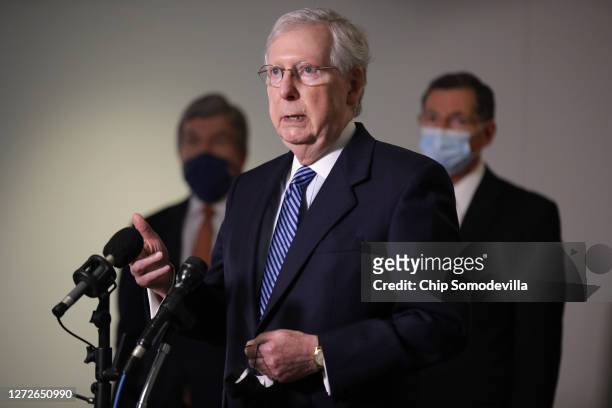Senate Majority Leader Mitch McConnell talks to reporters following the weekly Republican policy luncheon in the Hart Senate Office Building on...