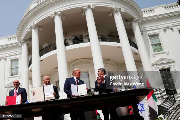 Foreign Affairs Minister of Bahrain Abdullatif bin Rashid Al Zayani, Prime Minister of Israel Benjamin Netanyahu, U.S. President Donald Trump, and...