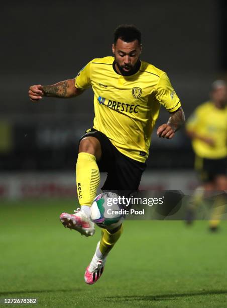 Kane Hemmings of Burton Albion controls the ball during the Carabao Cup Second Round match between Burton Albion and Aston Villa at Pirelli Stadium...