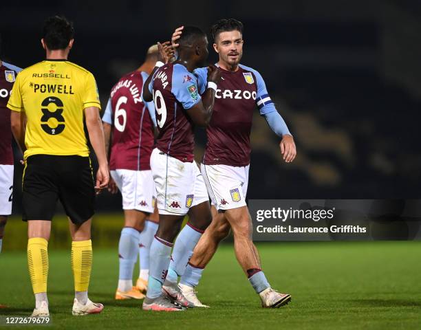 Jack Grealish of Aston Villa celebrates with teammates after scoring his team's second goal during the Carabao Cup Second Round match between Burton...