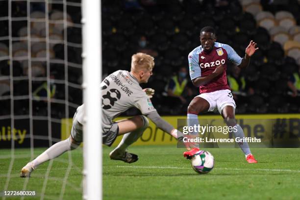 Keinan Davis of Aston Villa scores his team's third goal during the Carabao Cup Second Round match between Burton Albion and Aston Villa at Pirelli...