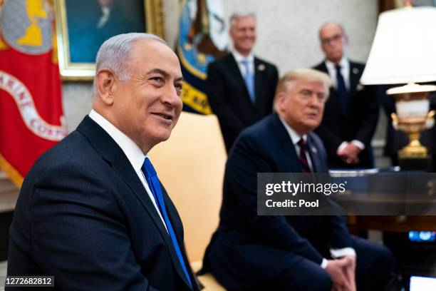 President Donald Trump and Prime Minister of Israel Benjamin Netanyahu participate in a meeting in the Oval Office of the White House on September...