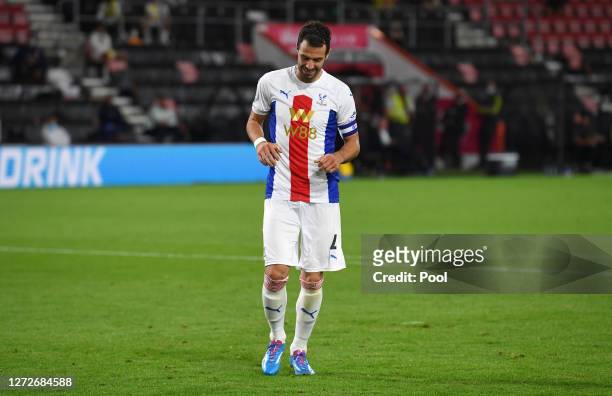 Luka Milivojevic of Crystal Palace reacts to having his sides 12th penalty saved which causes his team to lose on penalties during the Carabao Cup...