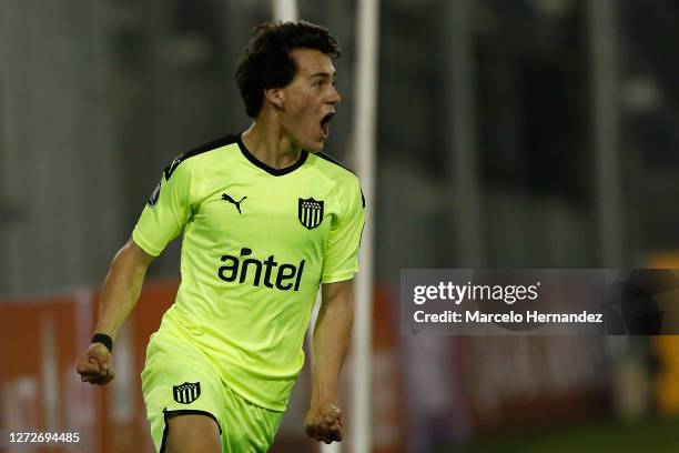 Facundo Pellistri of Peñarol celebrates after scoring the first goal of his team during a group C match between Colo Colo and Peñarol as part of Copa...